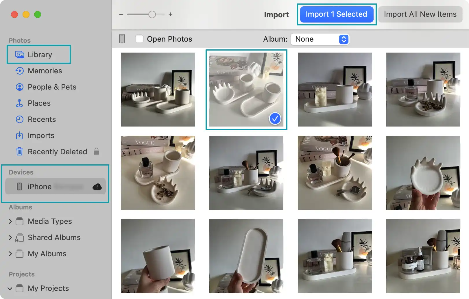 Photos app with iPhone connected for importing HEIC photos